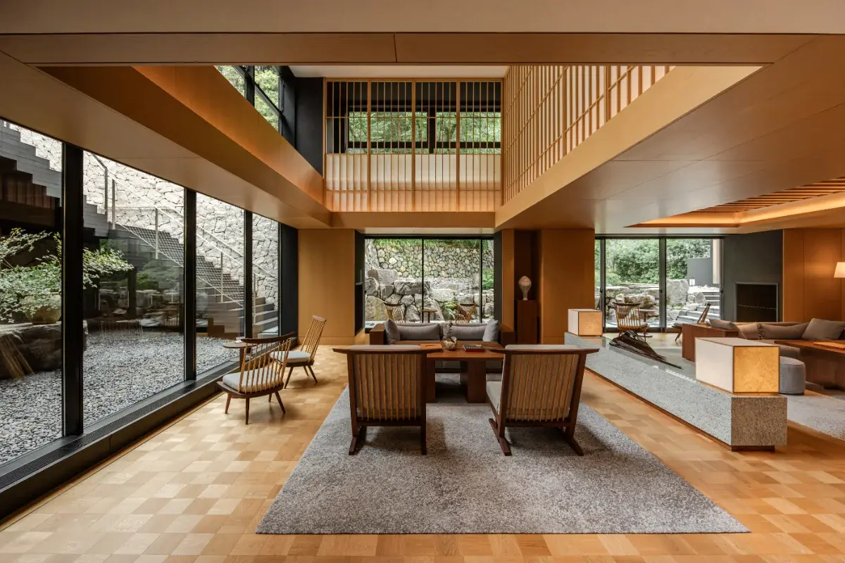 Timber-lined lounge overlooking a garden in Kyoto