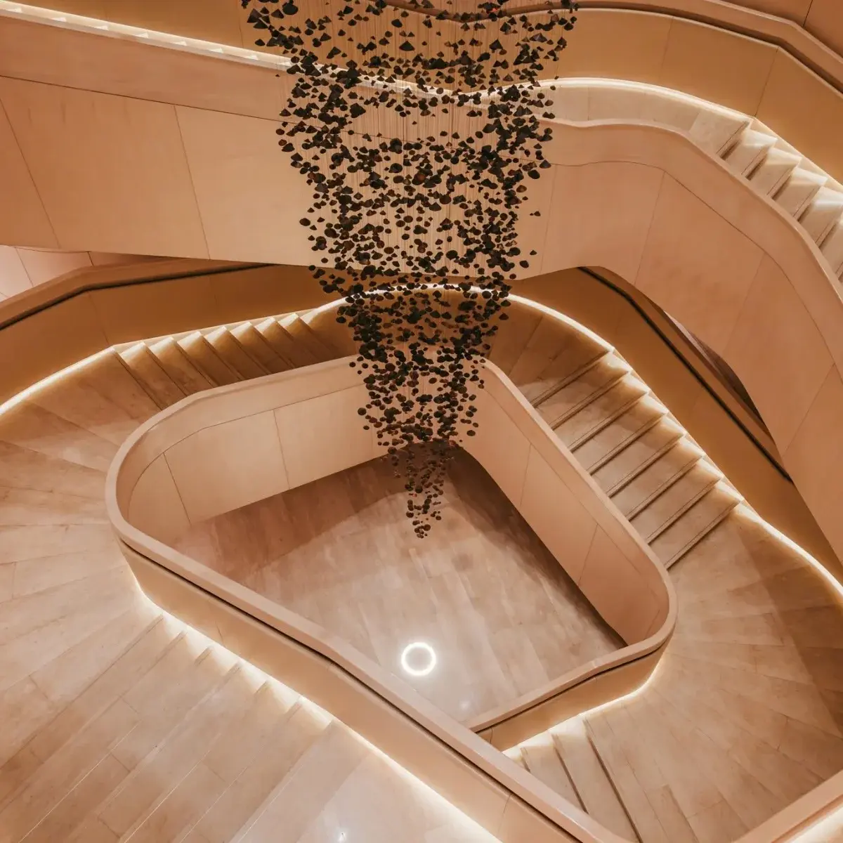 Bronze spiral staircase viewed from above at Park Hyatt Bangkok